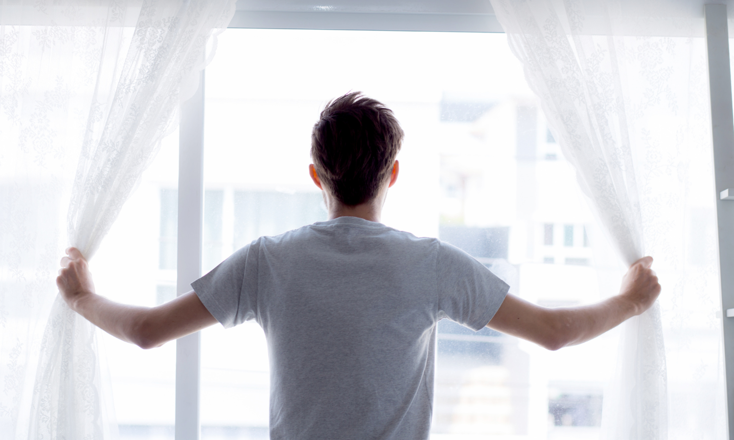 Man Looking Through The Window